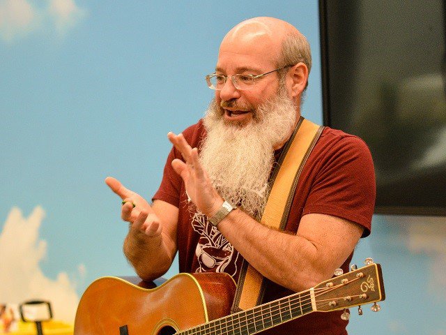 David Landau with guitar.