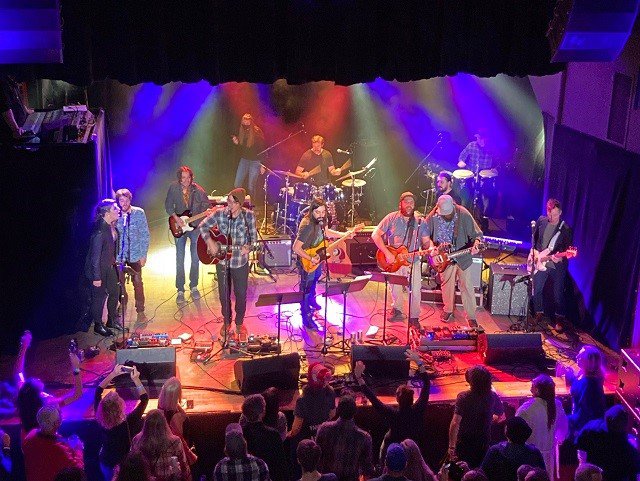 A band and guests on stage at the Majestic.