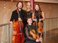 The Rabin String Quartet and instruments.