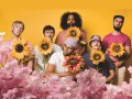 Joe Hertler &amp; the Rainbow Seekers and flowers.