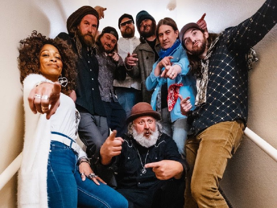 The People Brothers Band in a stairwell.