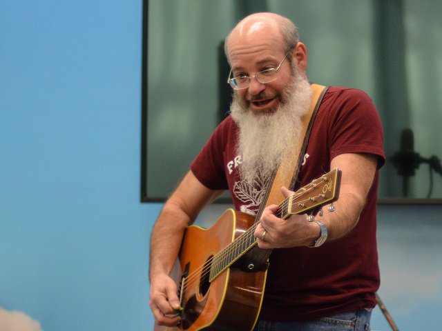 David Landau with guitar.