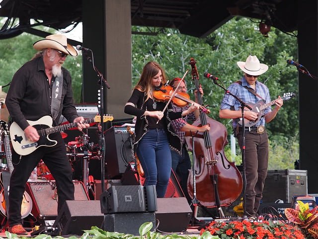 Four members of Asleep at the Wheel on stage.