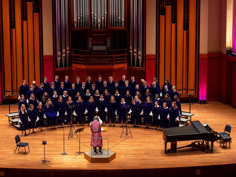 The St. Olaf Choir on a riser.