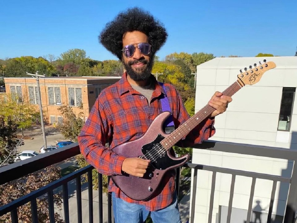 Harold "Fro" Davis and guitar.