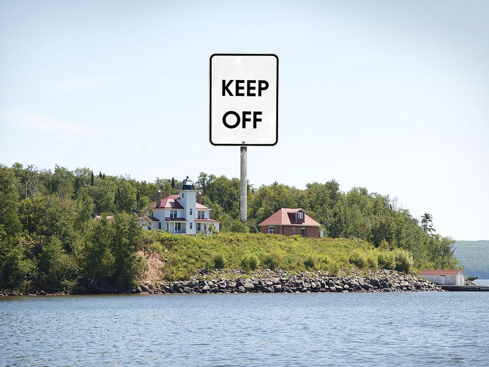 A "keep off" sign on Raspberry Island.