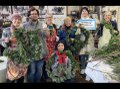 Past participants in a peace wreath workshop.