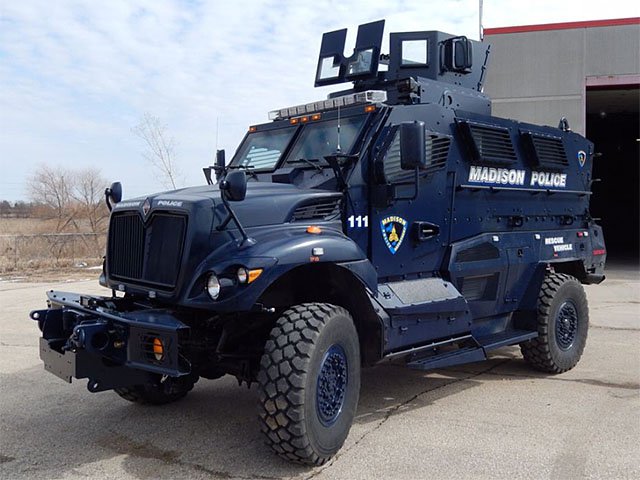 Cover Militarized Police Armored Vehicle 08132015 ?cb=6f6149f081a702840df9277bae5b68bc&w=1200