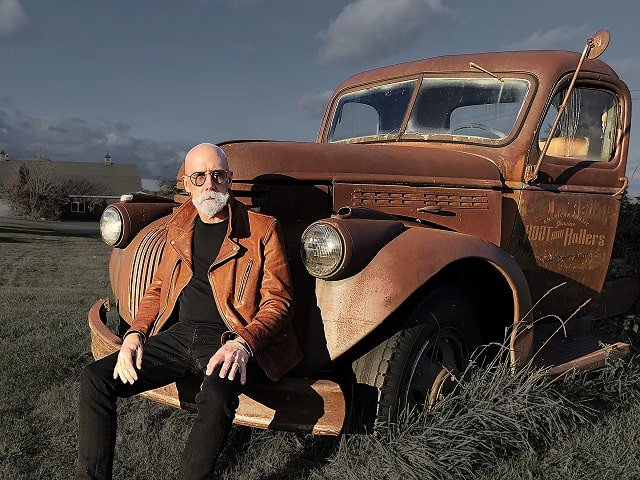 Bob Hoot of HOOT and Hollers with a vintage vehicle.