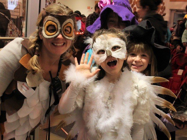 Participants in owl costumes at a past Fall Fest event at Aldo Leopold Nature Center.