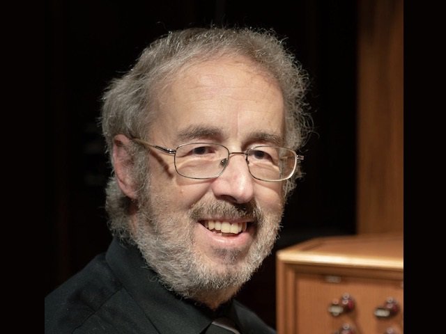 A close up of organist Mark Brampton Smith.