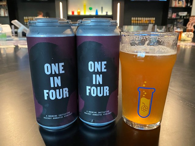 "One in Four" beer in cans and in a pint glass.