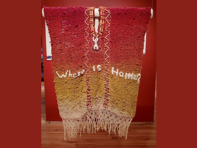 A textile work asks the question "Where is home?"