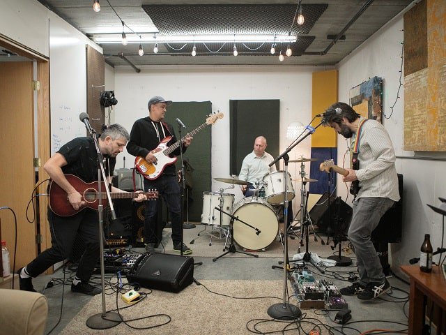 A past lineup of the band Vacant Church during practice.