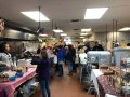 Displays of food items in a commercial kitchen.