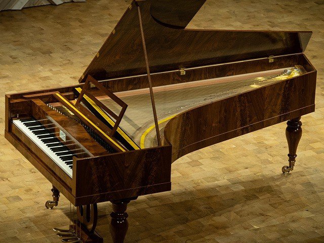 A close up of an 1820s-style Viennese fortepiano.