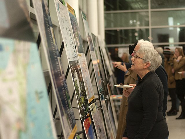 The public looks at some of the plans at the Monona Waterfront Design Challenge on January 26, 2022.