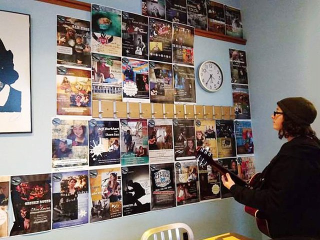 A wall of music posters.