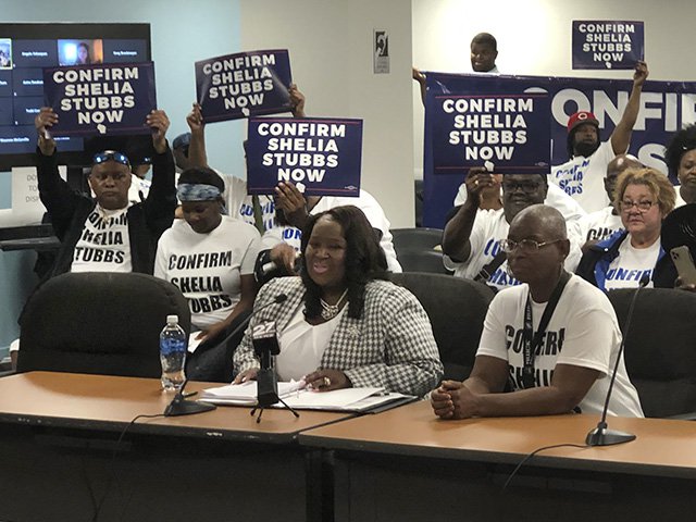 Shelia Stubbs and supporters at April 27 meeting of board’s Health and Human Needs Committee