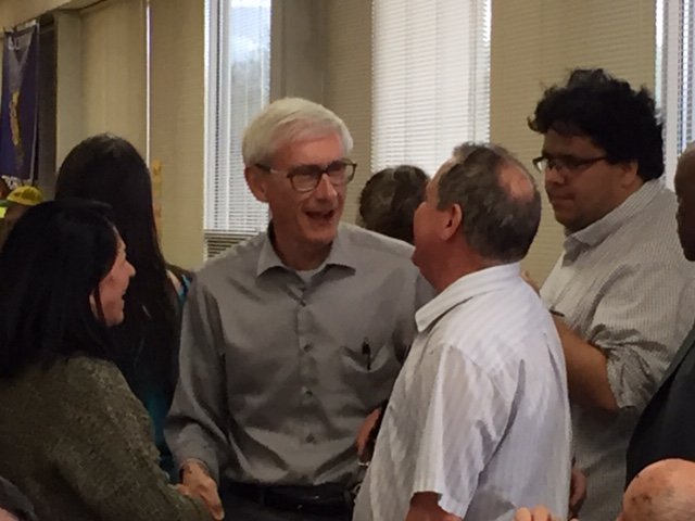 Gov. Tony Evers (center) speaks to attendees of the 2019 South Central Federation of Labor Bean Feed.