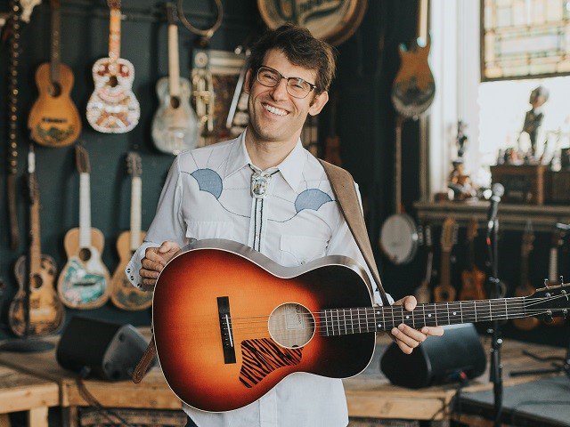 Jackson Emmer and guitar.