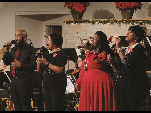 Mt. Zion Gospel Choir members singing at the 2022 Gospel Carols concert.