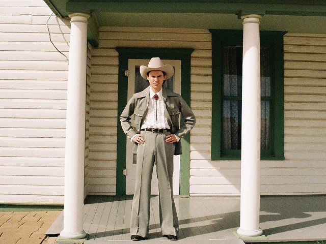 Hayden Pedigo between two columns.