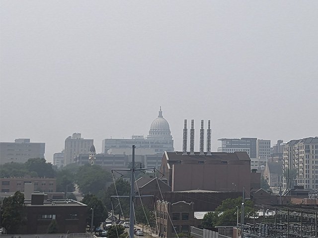 A view of the Capitol building through the smog on June 27, 2023.