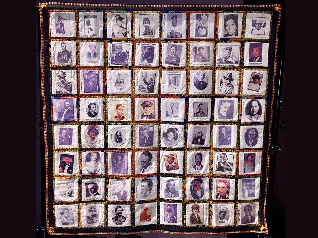 A picture of a quilt depicting Black historical figures.