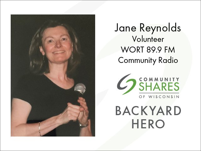 A photo of Jane Reynolds holding a microphone. The text says Jane Reynolds, volunteer, WORT 89.9 FM Community Radio. Below that is the Community Shares logo and the words Backyard Hero.