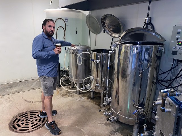 Trevor Easton and brewing equipment.