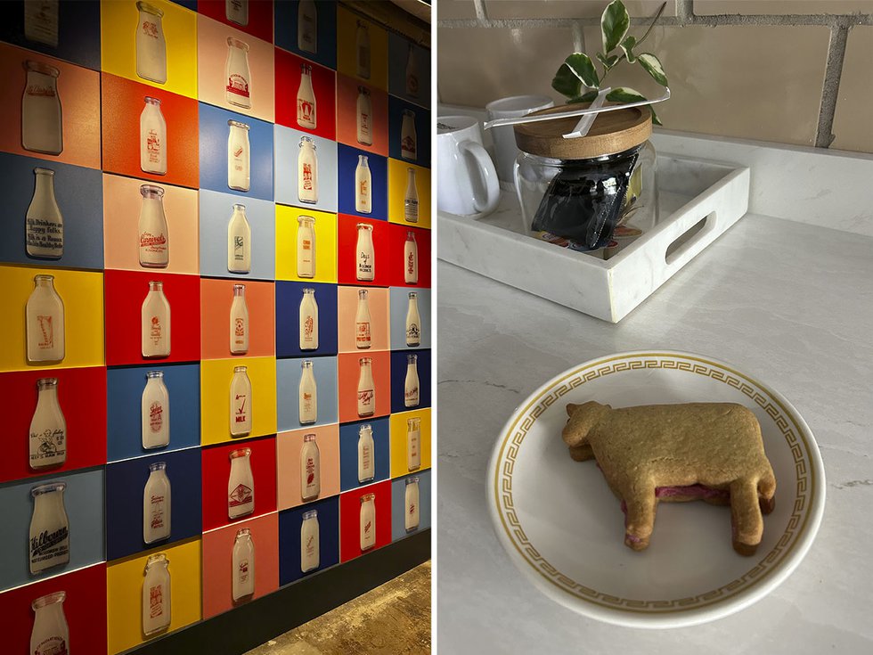Wall art of milk bottles, and a second photo of sugar cookies in the shape of a cow.