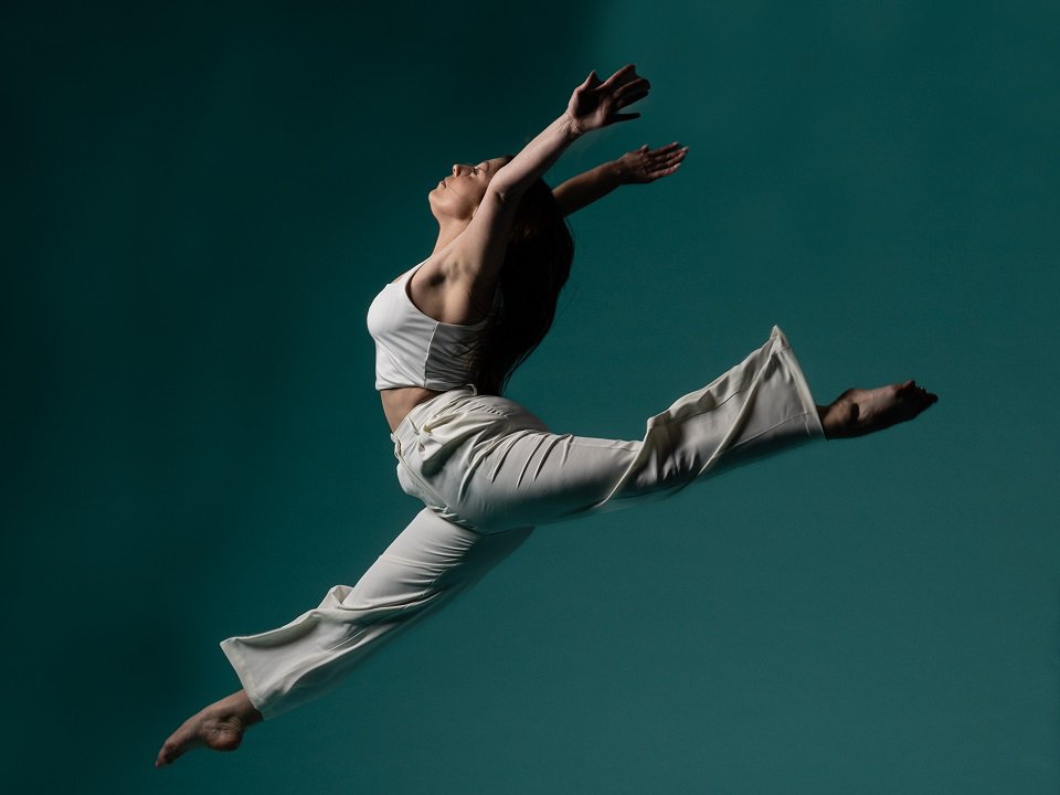 A Madison Contemporary Dance company member mid-flight.