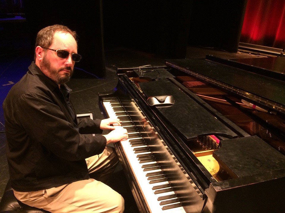 Dave Stoler at the piano.