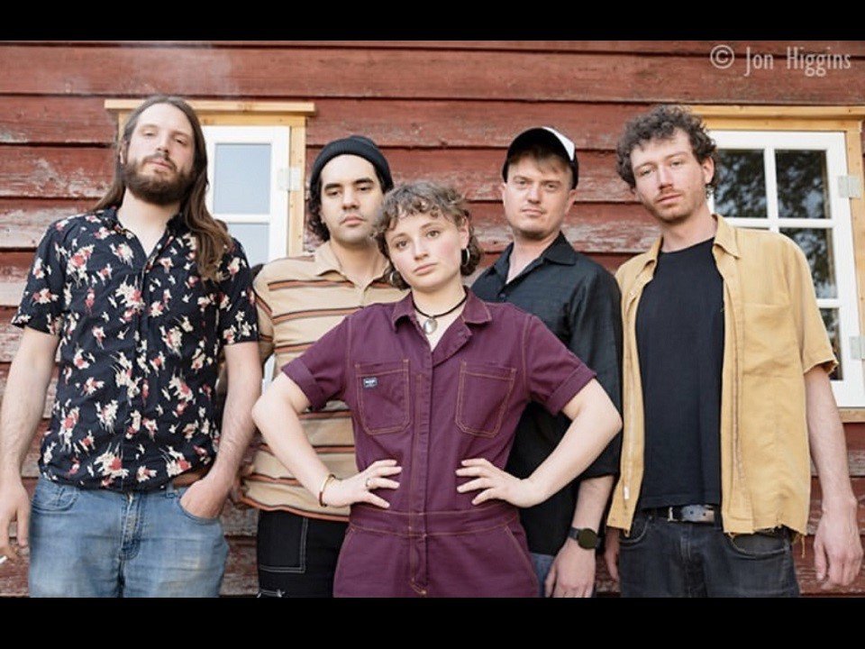 Jane Hobson (center) and band.