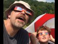 Andy Rash and son with eclipse-viewing glasses.
