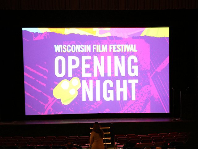 The screen at the Barrymore showing a still that says Wisconsin Film Festival Opening Night.