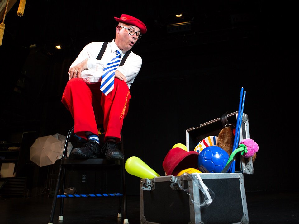 Kenny Ahern performing in the one-person show "To Laugh is to Live!"