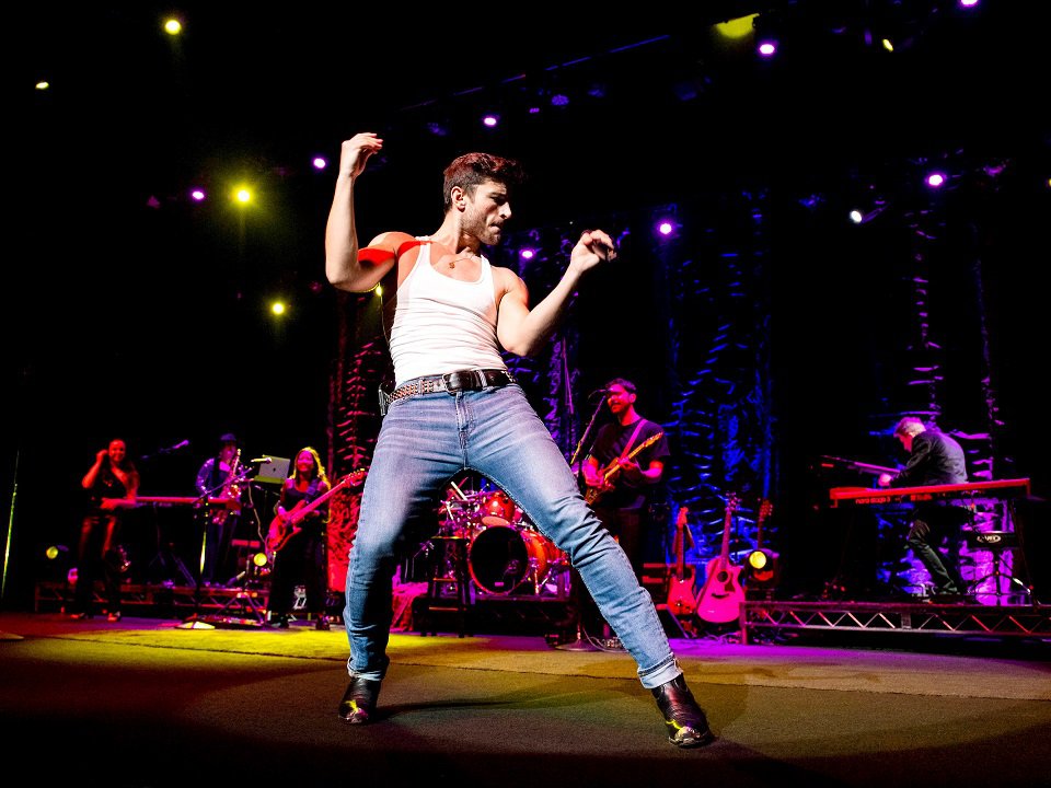 A past performance of the tribute show "The Life and Music of George Michael."