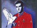 Detail from a vintage poster featuring anti-war soldier David Cortright holding a live dove.