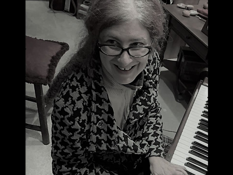 Nancy Rost at the keys.