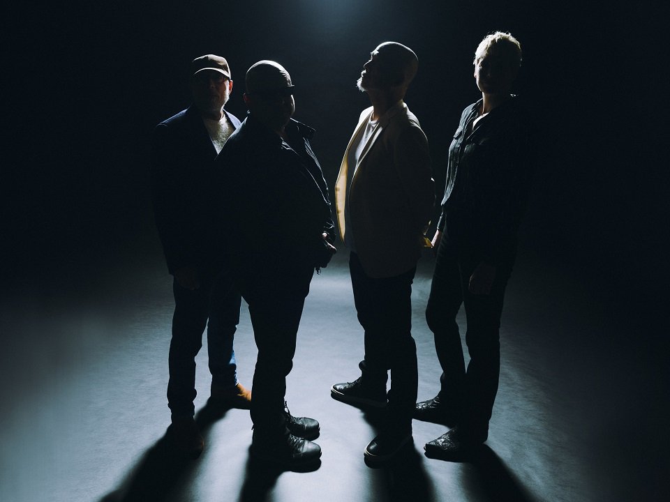 The band Pixies in shadows.