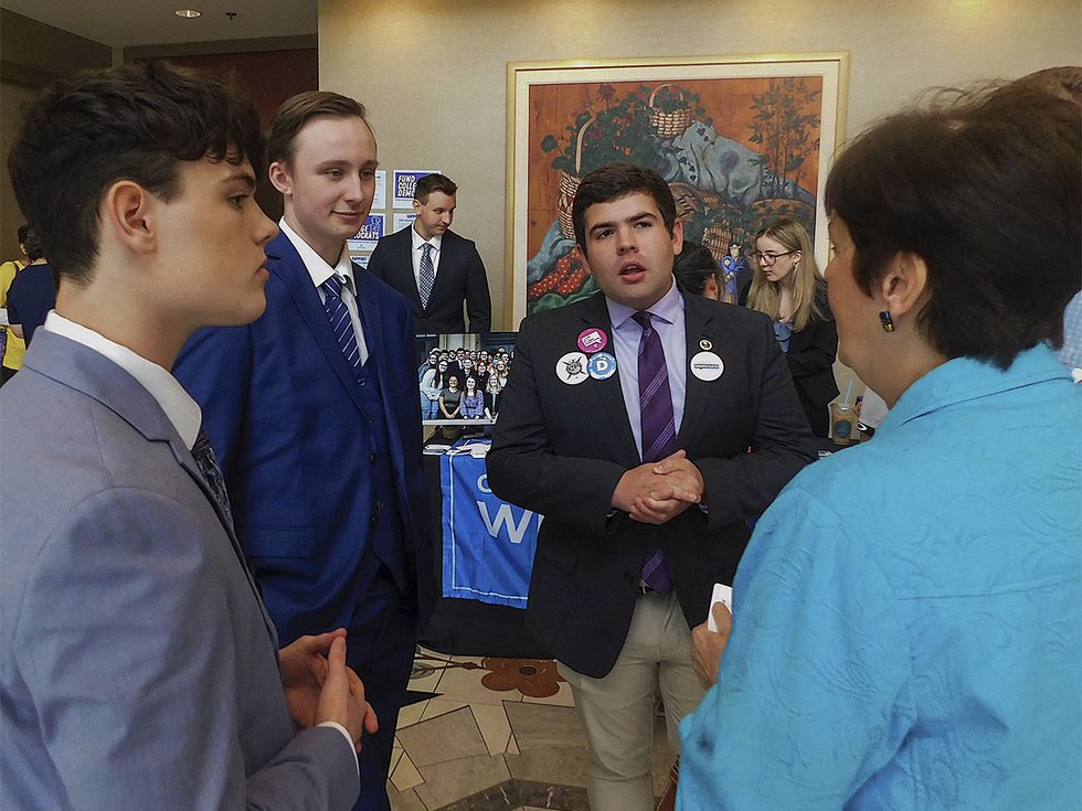 Matthew Lehner (second from right), a UW-Eau Claire student and chair of the College Democrats of Wisconsin.