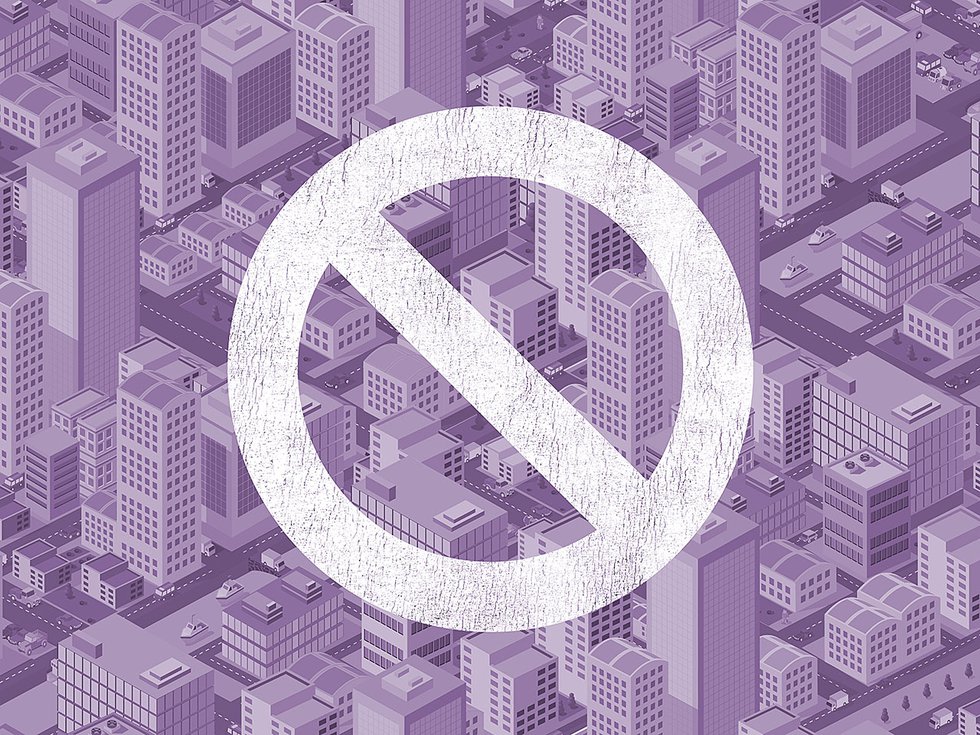 A dense cityscape with a "no" symbol over the top of it.
