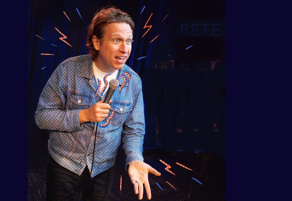 Pete Holmes and a mic.