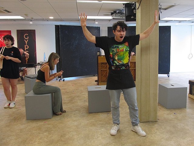 Andrew Linden (foreground) and cast members rehearse for "Tick, Tick...Boom!"