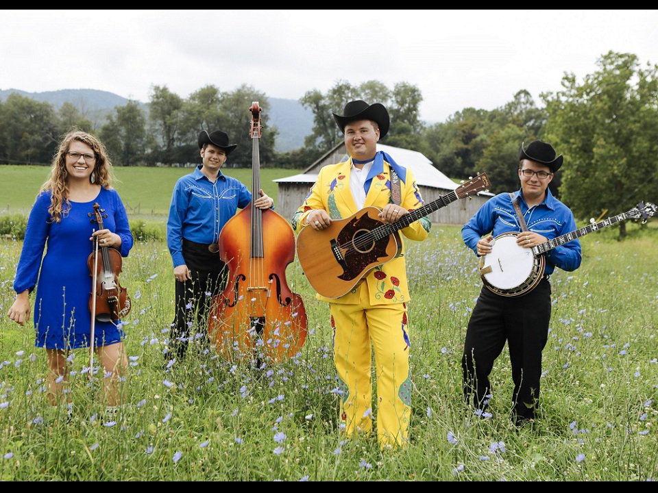 The Kody Norris Show and instruments in a field.