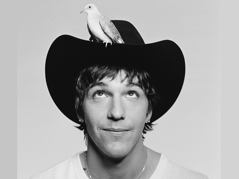 Role Model and a bird on his hat.