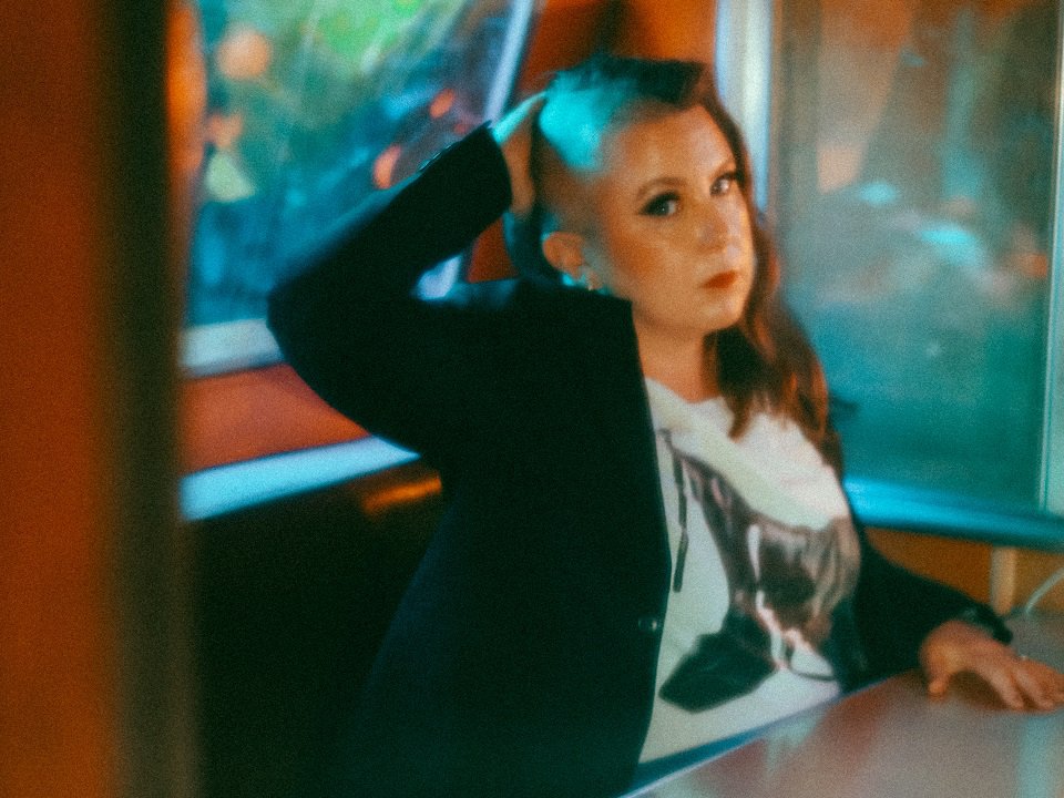 Tina Horn sitting at a table.