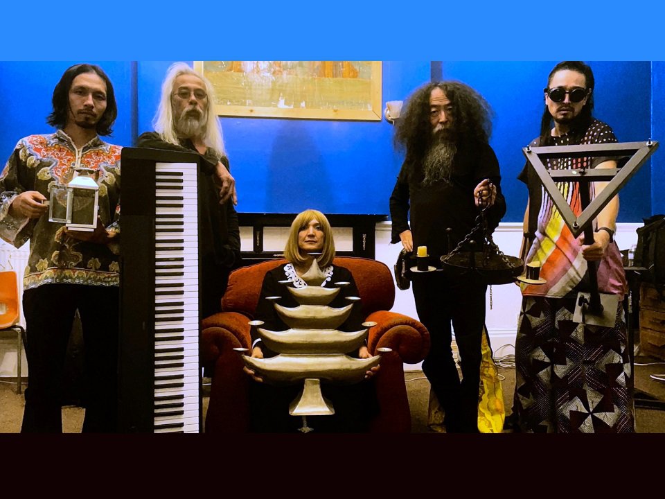 The five members of Acid Mothers Temple and instruments.